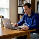 Man starting a secure crypto transaction at desk