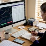 Woman reviewing crypto trading fees at desk