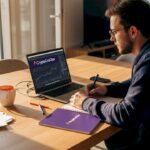 Man studying crypto at dining table