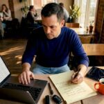 Investor reviewing crypto risk at kitchen table
